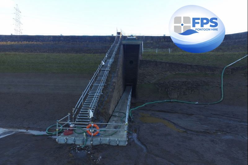 Long modular pontoon walkway installed at a Brecon Beacons reservoir for silt removal works