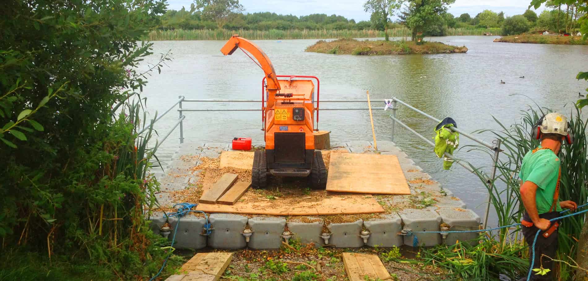 FPS modular floating pontoon providing access for watercourse maintenance beside a river or channel