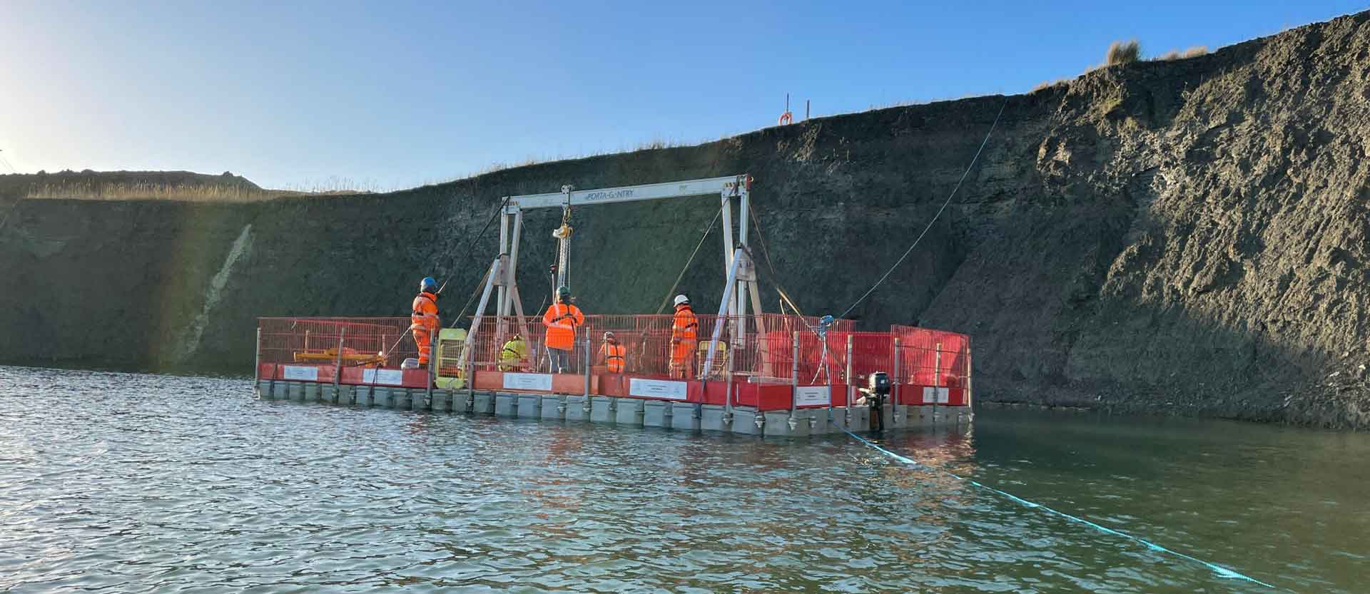 Floating pontoon access supporting a pump during silt-removal and water-management works