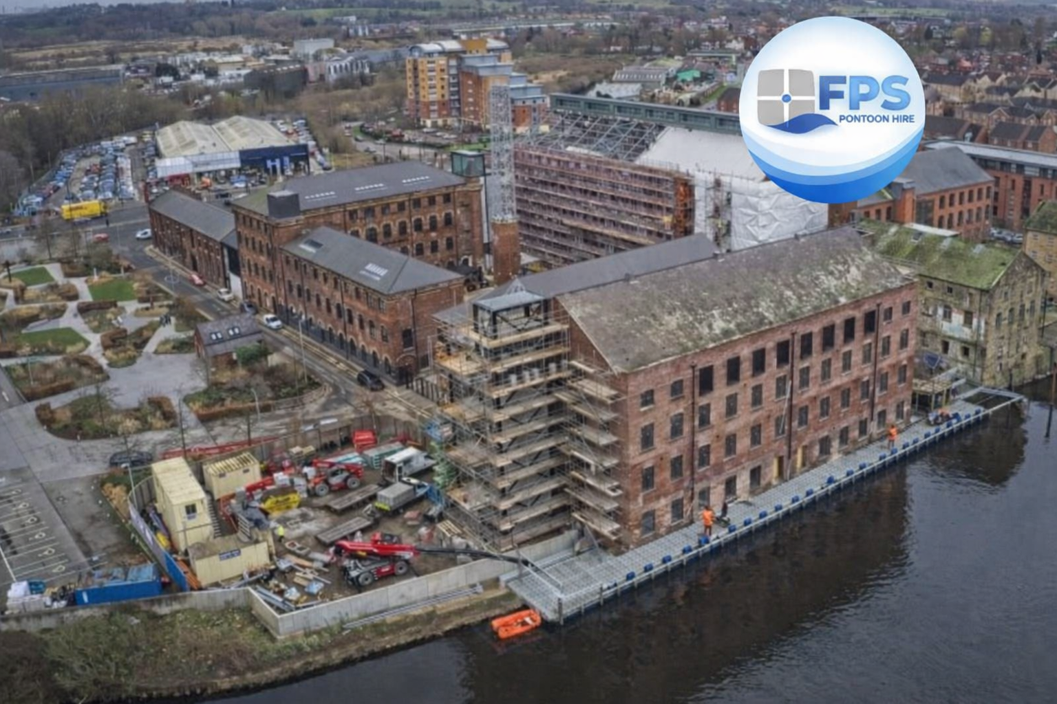 Floating pontoon access platform configured around steel columns at Rutland Mills