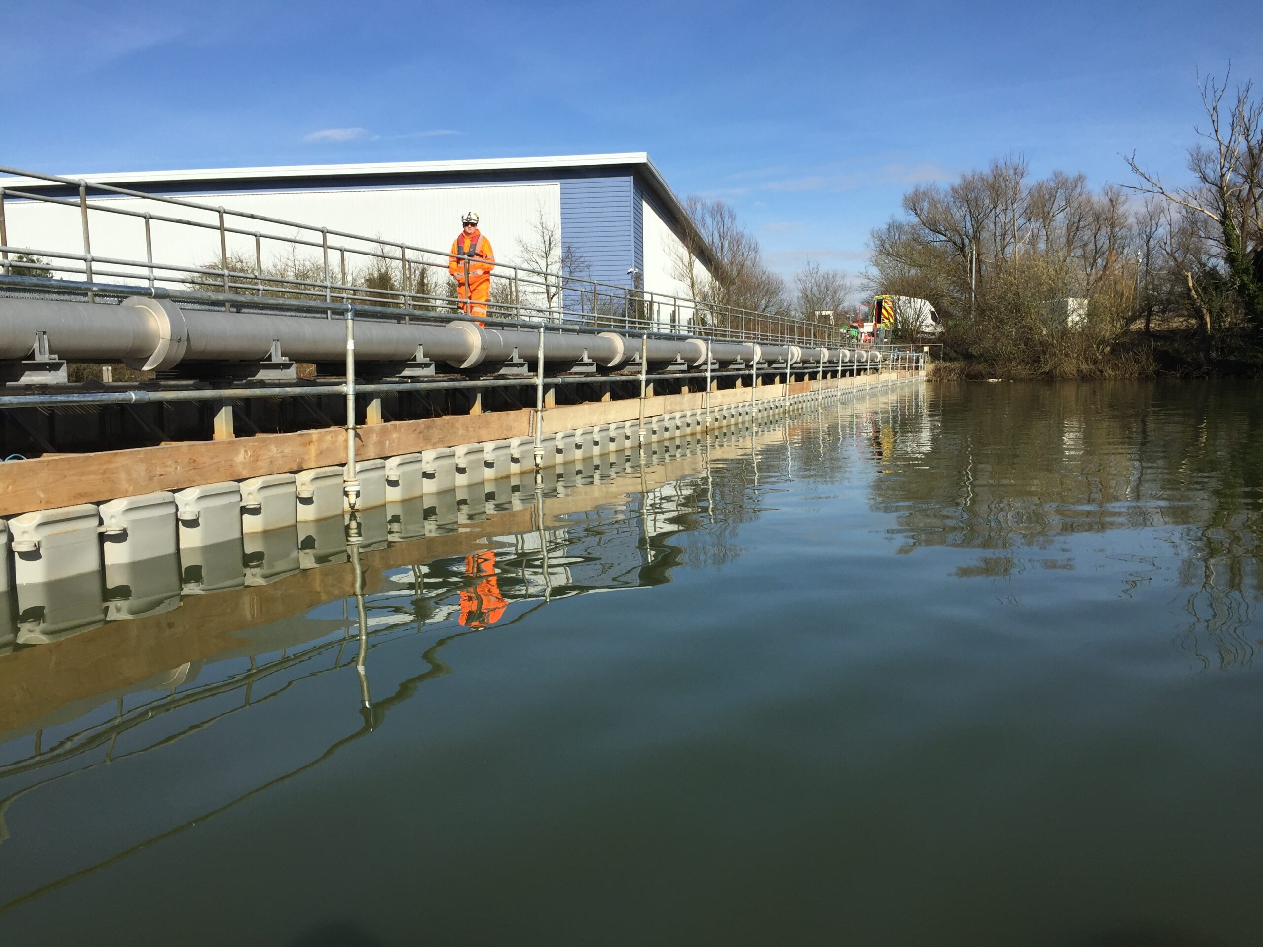 Completed floating pontoon access platform beside the aerator pipe at Heathrow Airport