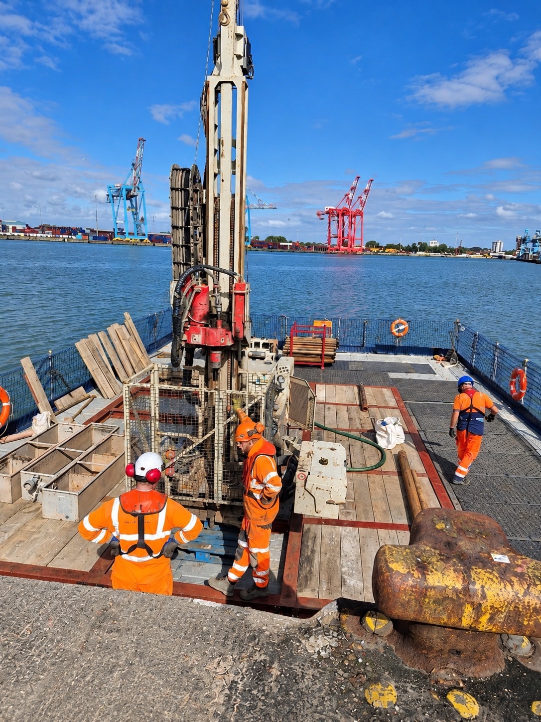 Drilling rig and site team working from an FPS Pontoon Hire modular floating platform at Peel Ports Liverpool.