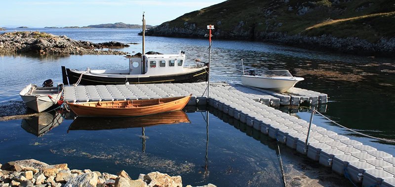 L-shaped VersaDock pontoon with moored boats